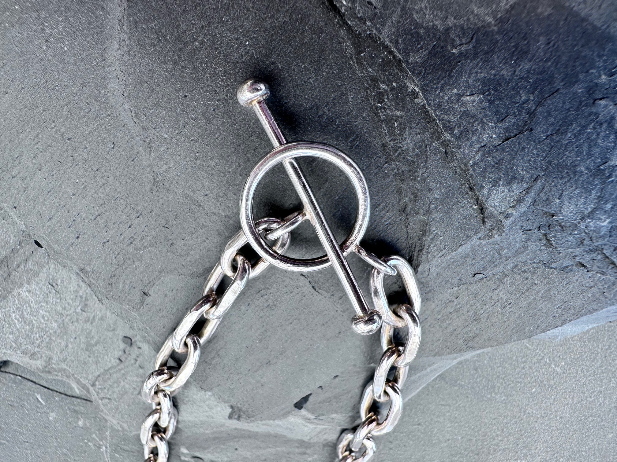 1,8 mm pulled oval chain with a ring and pin